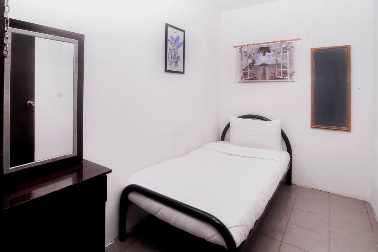 Spot On 89886 Backpacker'S Stay Services Kuching Extérieur photo