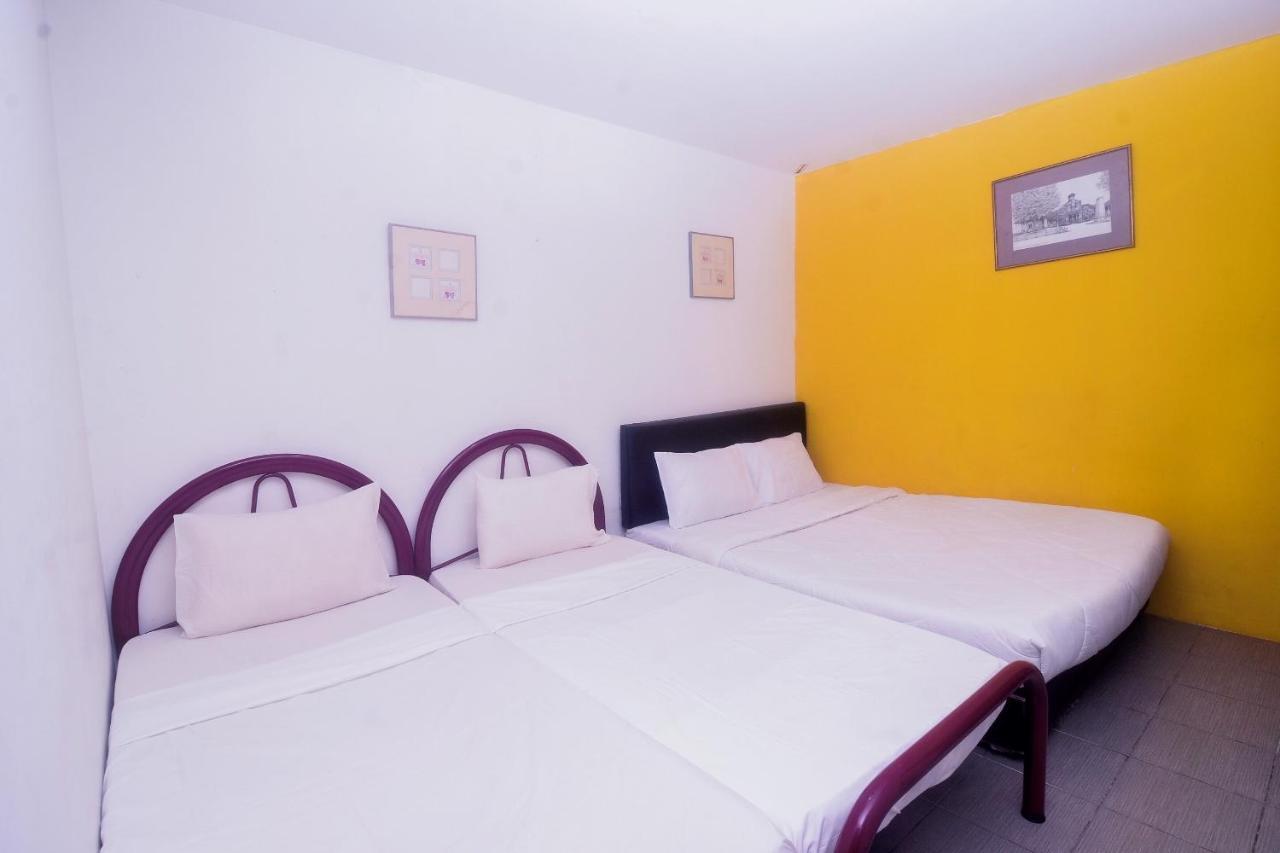 Spot On 89886 Backpacker'S Stay Services Kuching Extérieur photo