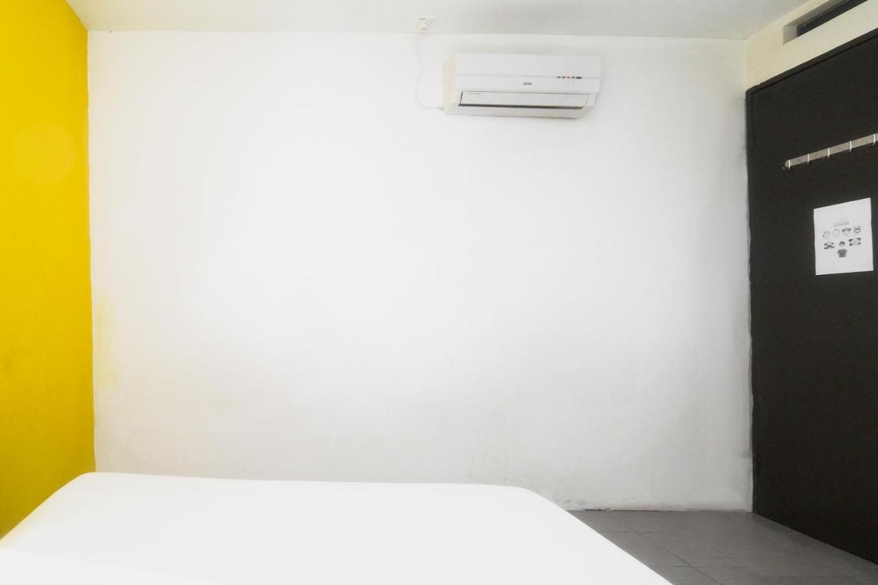 Spot On 89886 Backpacker'S Stay Services Kuching Extérieur photo