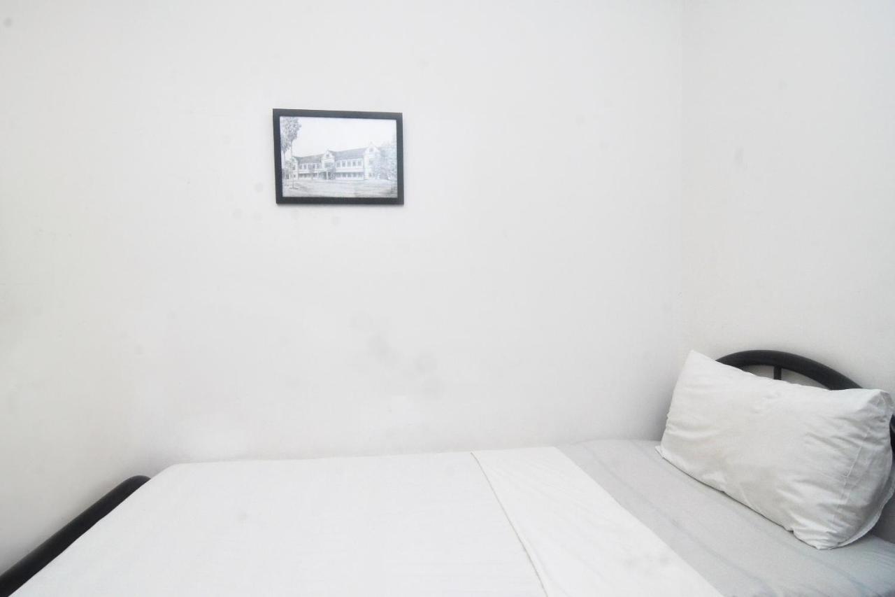 Spot On 89886 Backpacker'S Stay Services Kuching Extérieur photo