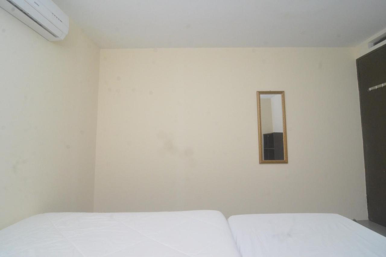 Spot On 89886 Backpacker'S Stay Services Kuching Extérieur photo