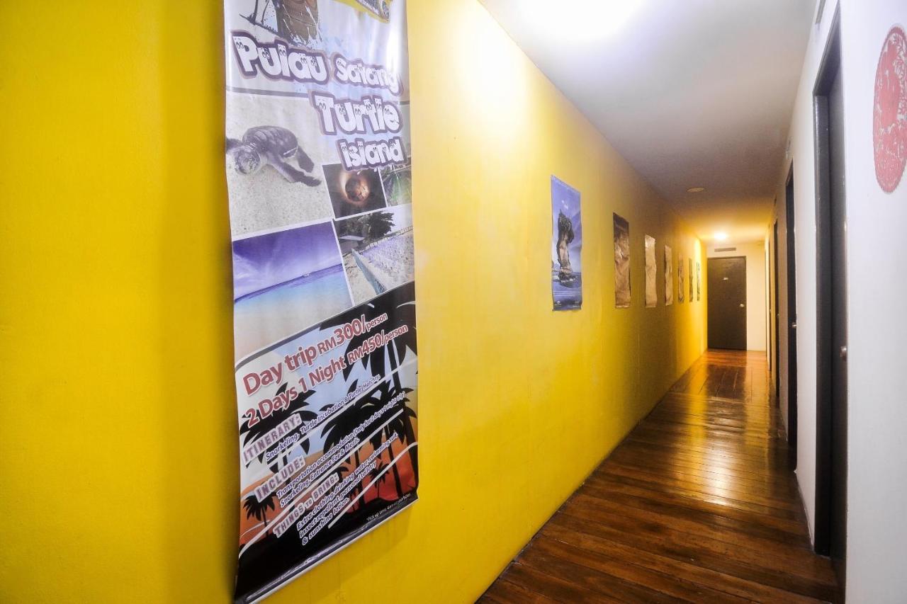 Spot On 89886 Backpacker'S Stay Services Kuching Extérieur photo