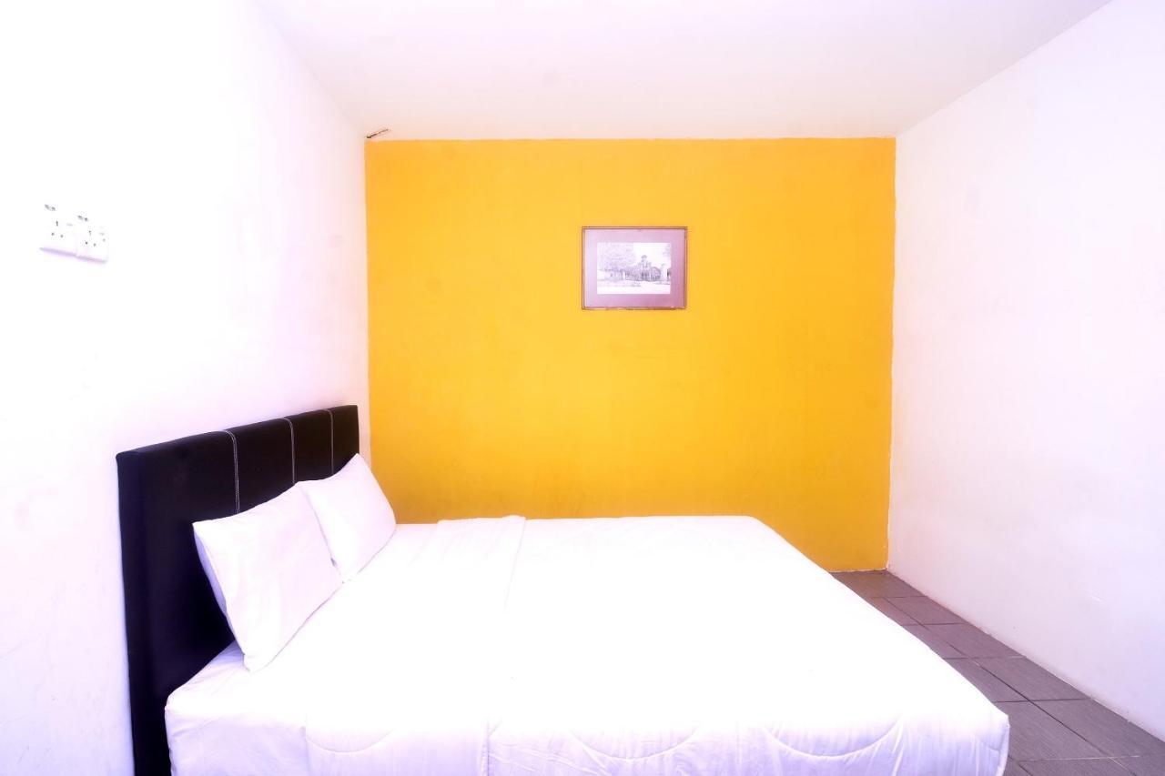 Spot On 89886 Backpacker'S Stay Services Kuching Extérieur photo
