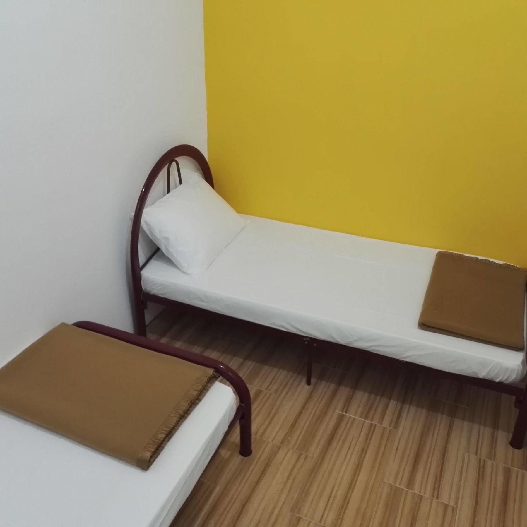 Spot On 89886 Backpacker'S Stay Services Kuching Extérieur photo