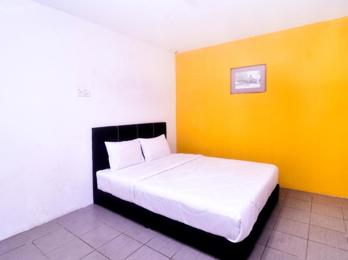 Spot On 89886 Backpacker'S Stay Services Kuching Extérieur photo