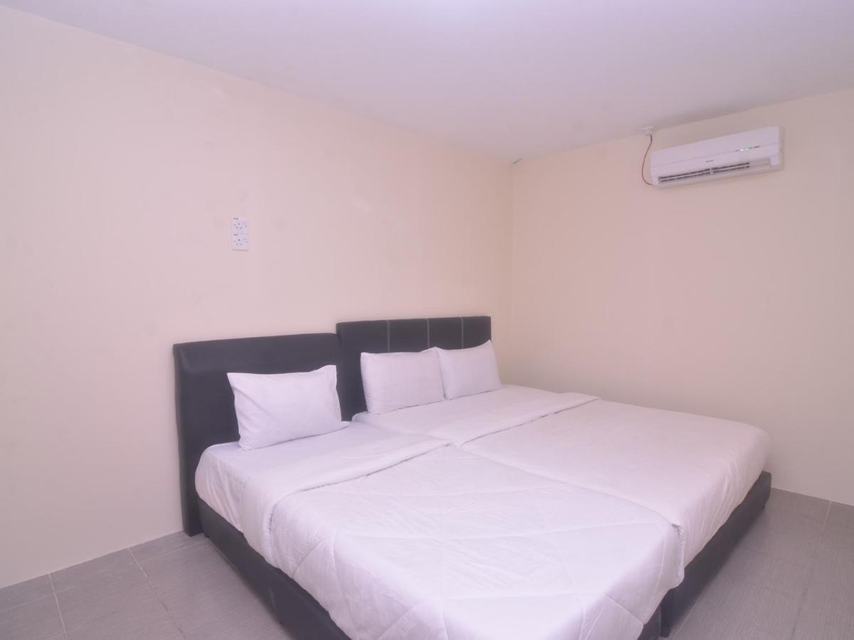 Spot On 89886 Backpacker'S Stay Services Kuching Extérieur photo