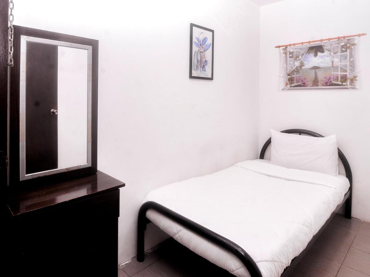 Spot On 89886 Backpacker'S Stay Services Kuching Extérieur photo