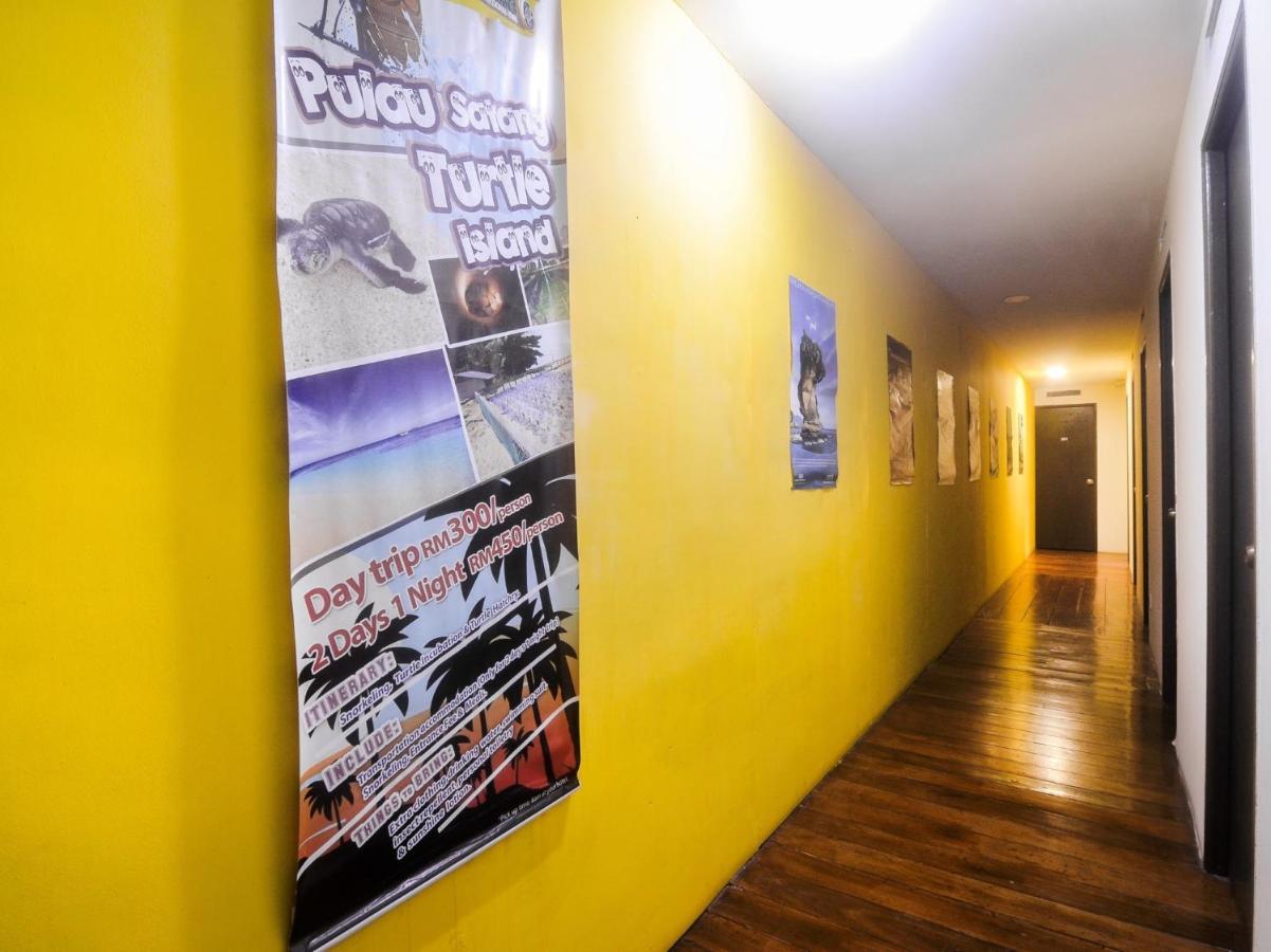 Spot On 89886 Backpacker'S Stay Services Kuching Extérieur photo
